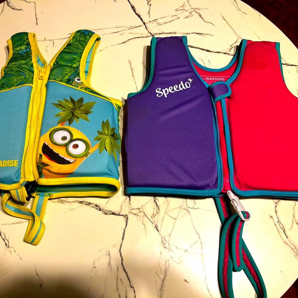 Two swim vests